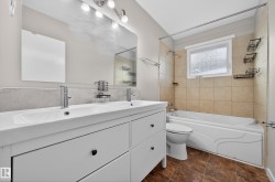 Bathroom with double vanity and  shower combination - 
