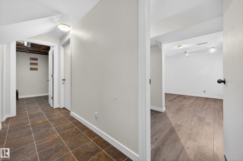 Hallway with baseboards - 8328 164 Street, Edmonton, AB - Indoor Photo Showing Other Room