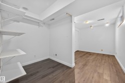 Empty room with wood finished floors and baseboards - 