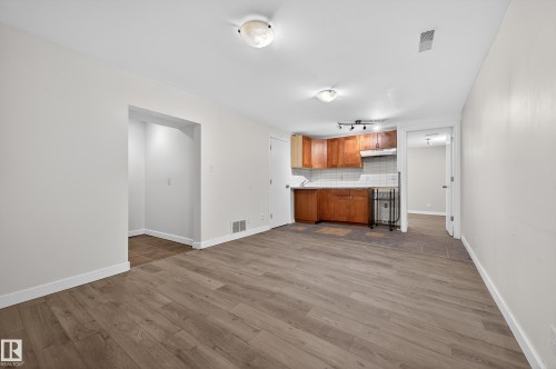 Unfurnished living room with light wood-style floors - 8328 164 Street, Edmonton, AB - Indoor
