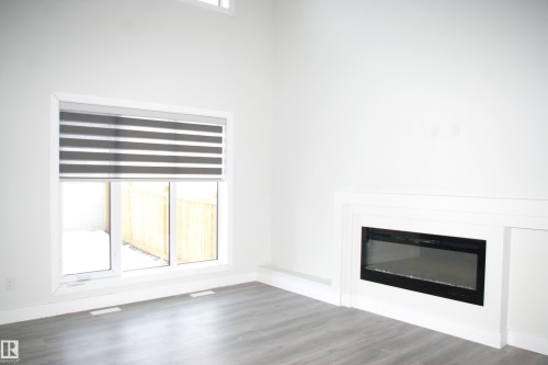 3706 46 Avenue, Beaumont, AB - Indoor With Fireplace