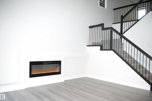3706 46 Avenue, Beaumont, AB - Indoor With Fireplace