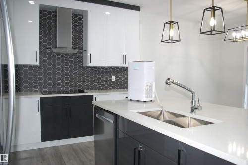 3706 46 Avenue, Beaumont, AB - Indoor Photo Showing Kitchen With Double Sink With Upgraded Kitchen