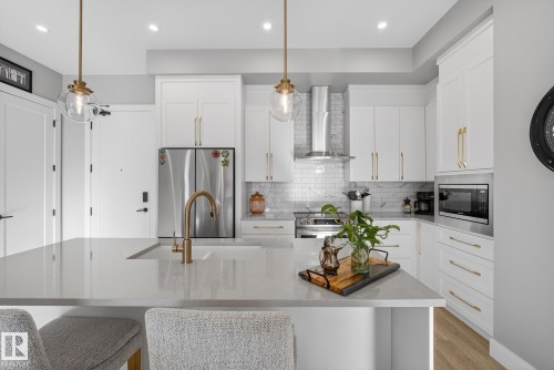 401 7471 May Common, Edmonton, AB - Indoor Photo Showing Kitchen With Upgraded Kitchen