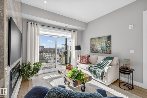 401 7471 May Common, Edmonton, AB - Indoor Photo Showing Living Room