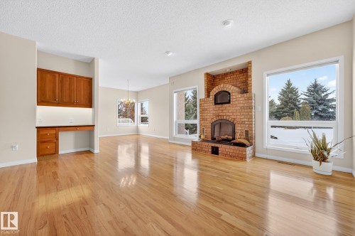 83 53302 Rge Road 261, Rural Parkland County, AB - Indoor Photo Showing Living Room With Fireplace