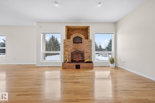 83 53302 Rge Road 261, Rural Parkland County, AB - Indoor Photo Showing Other Room With Fireplace