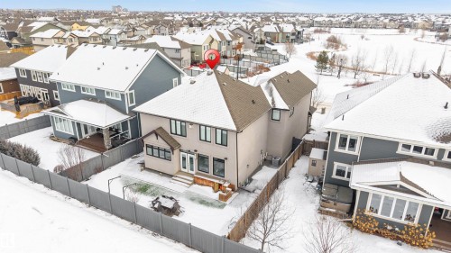Snowy aerial view featuring a residential view - 656 180 Street, Edmonton, AB - Outdoor