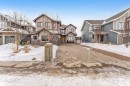 View of front of home featuring stone siding - 656 180 Street, Edmonton, AB  - Outdoor With Facade 