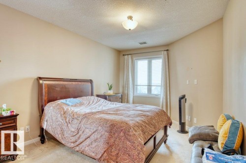319 6083 Maynard Way, Edmonton, AB - Indoor Photo Showing Bedroom
