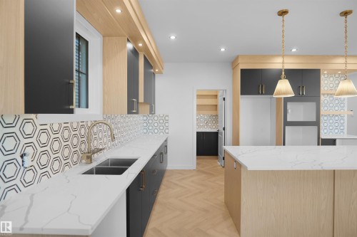 27 Trill Point(E), Spruce Grove, AB - Indoor Photo Showing Kitchen With Double Sink