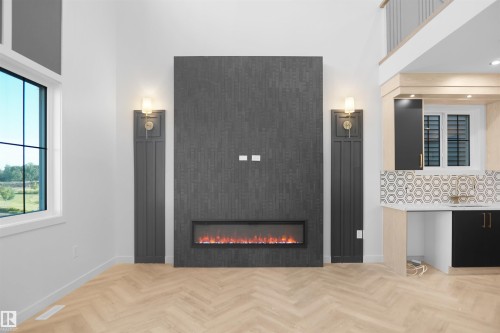 27 Trill Point(E), Spruce Grove, AB - Indoor Photo Showing Other Room With Fireplace