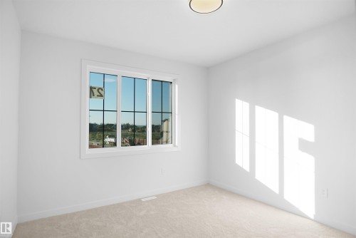 27 Trill Point(E), Spruce Grove, AB - Indoor Photo Showing Other Room
