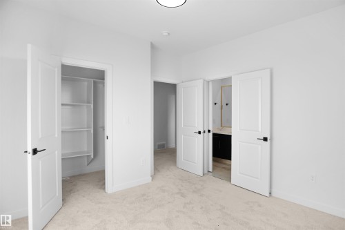 27 Trill Point(E), Spruce Grove, AB - Indoor Photo Showing Other Room