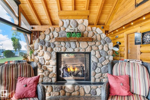 #1 Martin Road, Rural Lac Ste. Anne County, AB - Indoor Photo Showing Living Room With Fireplace
