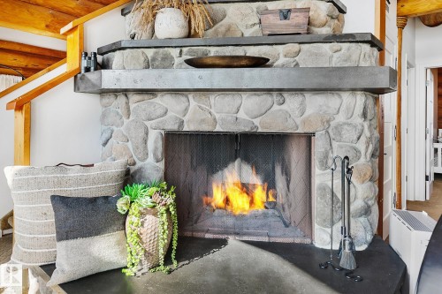 #1 Martin Road, Rural Lac Ste. Anne County, AB - Indoor Photo Showing Living Room With Fireplace