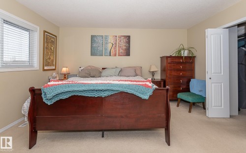 Bedroom with light carpet - 20628 49 Avenue, Edmonton, AB - Indoor Photo Showing Bedroom