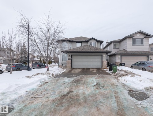 View of front facade with brick siding - 20628 49 Avenue, Edmonton, AB - Outdoor With Facade