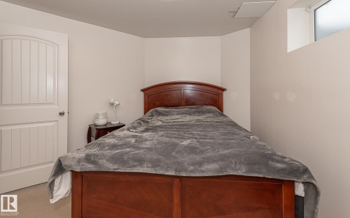 Bedroom featuring light carpet - 20628 49 Avenue, Edmonton, AB - Indoor Photo Showing Bedroom