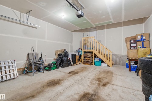 Garage featuring a garage door opener - 452 Roberts Crescent, Leduc, AB - Indoor Photo Showing Garage