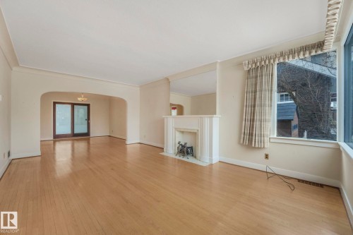 10429 Saskatchewan Drive, Edmonton, AB - Indoor With Fireplace