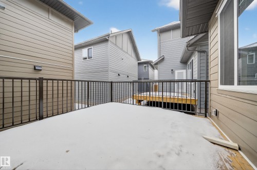 View of patio featuring a wooden deck - 6115 Crawford Drive, Edmonton, AB - Outdoor With Exterior