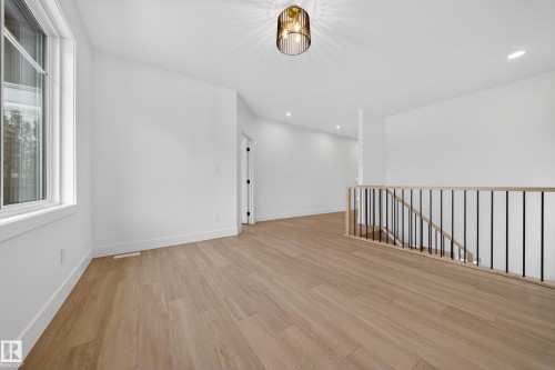 Spare room with light wood finished floors and recessed lighting - 6115 Crawford Drive, Edmonton, AB - Indoor Photo Showing Other Room