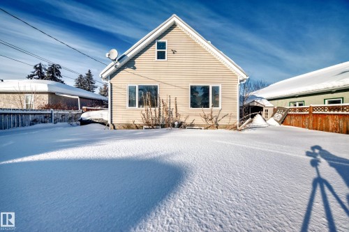 Rear view of house featuring an outbuilding - 10115 104, Westlock, AB - Outdoor