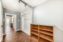 Mudroom with baseboards and rail lighting - 10115 104, Westlock, AB  - Indoor Photo Showing Other Room 