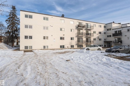 Snow covered building with a view of apartment building / complex - 102 10735 81 Avenue, Edmonton, AB - Outdoor