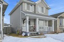 View of front of property featuring covered porch, roof with shingles, and a gate - 3010 32 Avenue Nw, Edmonton, AB  - Outdoor With Deck Patio Veranda 