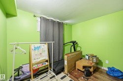 Interior space with baseboards and wood finished floors - 