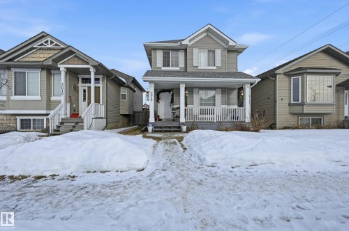 View of front of house featuring a porch and roof with shingles - 3010 32 Avenue Nw, Edmonton, AB - Outdoor With Deck Patio Veranda With Facade