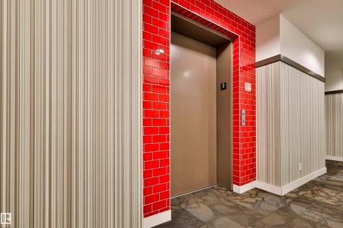 Entrance to property with elevator - 203 9908 84 Avenue, Edmonton, AB - Indoor