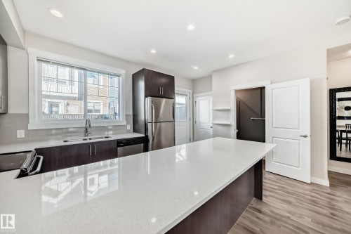 60 903 Crystallina Nera Way, Edmonton, AB - Indoor Photo Showing Kitchen With Double Sink With Upgraded Kitchen
