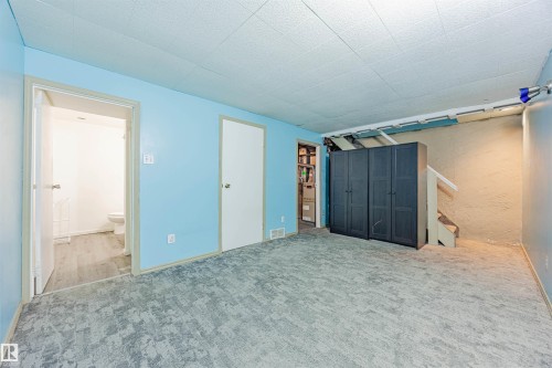 Family room in the finished lower level - 2551 135 Avenue, Edmonton, AB - Indoor Photo Showing Other Room