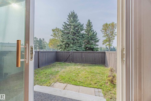 View of south facing fenced backyard that backs onto a huge park - 2551 135 Avenue, Edmonton, AB -  Photo Showing Other Room