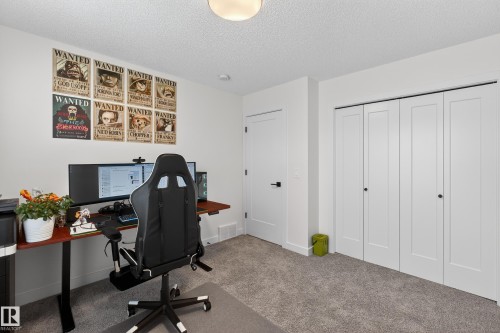 Office area featuring a textured ceiling and carpet floors - 2098 Graydon Hill Crescent, Edmonton, AB - Indoor Photo Showing Office
