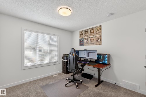 Office space with light carpet and a textured ceiling - 2098 Graydon Hill Crescent, Edmonton, AB - Indoor Photo Showing Office