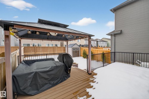 Deck with a storage unit, a gazebo, a fenced backyard, a residential view, and a grill - 2098 Graydon Hill Crescent, Edmonton, AB - Outdoor With Deck Patio Veranda With Exterior