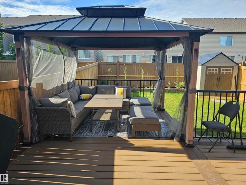 Wooden terrace with outdoor lounge area, a shed, a fenced backyard, and a gazebo - 2098 Graydon Hill Crescent, Edmonton, AB - Outdoor With Deck Patio Veranda With Exterior