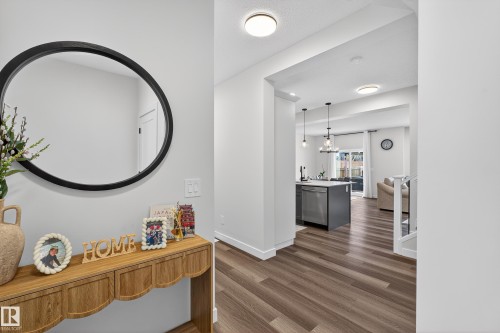 Corridor with dark wood-style flooring and baseboards - 2098 Graydon Hill Crescent, Edmonton, AB - Indoor Photo Showing Other Room