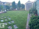 Fenced backyard with a storage unit - 5910 Anthony Crescent, Edmonton, AB  - Outdoor 