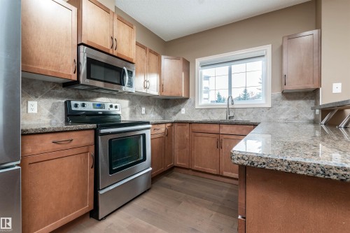 114 263 Macewan Road, Edmonton, AB - Indoor Photo Showing Kitchen With Stainless Steel Kitchen