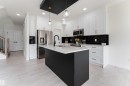112 Bluff Cove, Leduc, AB  - Indoor Photo Showing Kitchen With Upgraded Kitchen 