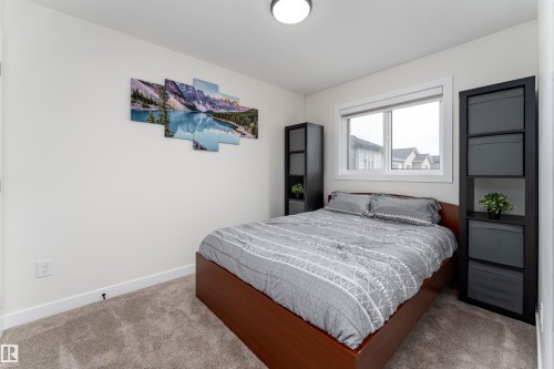 112 Bluff Cove, Leduc, AB - Indoor Photo Showing Bedroom