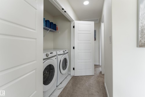 112 Bluff Cove, Leduc, AB - Indoor Photo Showing Laundry Room
