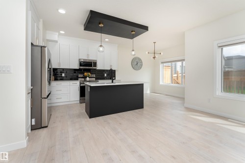 112 Bluff Cove, Leduc, AB - Indoor Photo Showing Kitchen With Upgraded Kitchen