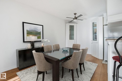 **VIRTUALLY STAGED** - 802 11920 100 Avenue, Edmonton, AB - Indoor Photo Showing Dining Room
