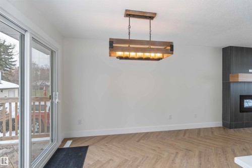 10309 167A Avenue, Edmonton, AB - Indoor Photo Showing Other Room With Fireplace